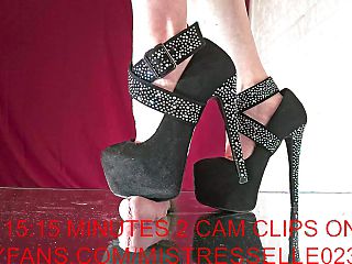 Mistress Elle in her diamond heels reminds her useless slave where he belongs